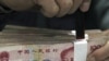 FMI: moneda china muy depreciada
