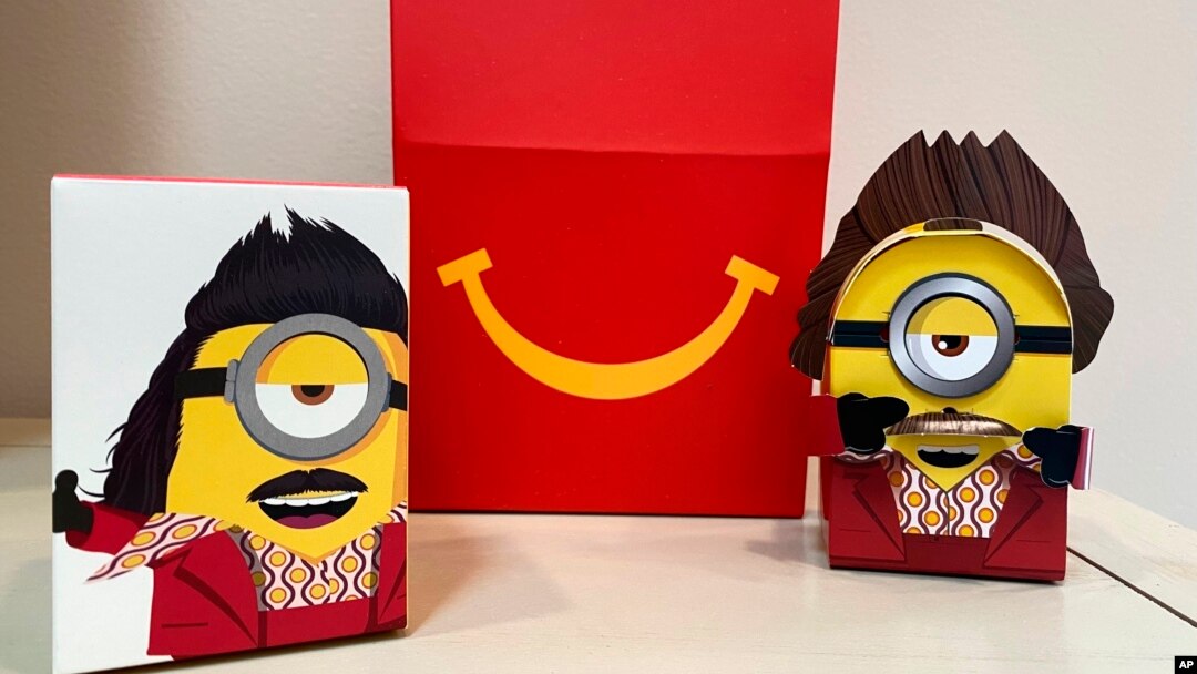 A cardboard McDonald’s Happy Meal toy is shown with a Happy Meal box on Sept. 20, 2021.