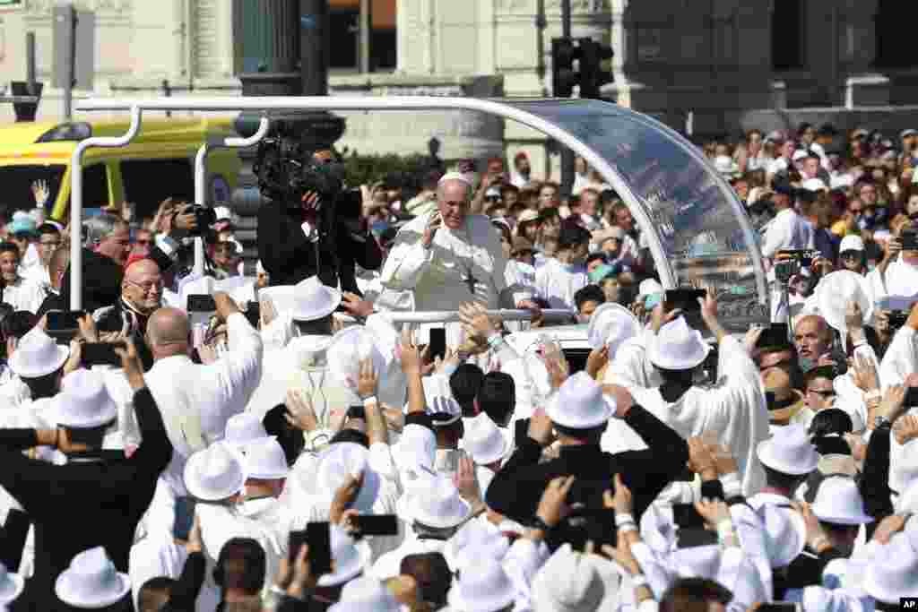 Pope Francis arrives to celebrate a Mass for the closing of the International Eucharistic Congress, at Budapest's Heroes Square, Hungary.