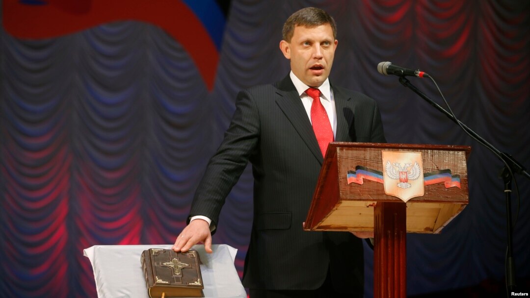 Separatist leader Alexander Zakharchenko is sworn in as the head of the self-proclaimed Donetsk People's Republic during a ceremony at a theatre in Donetsk, eastern Ukraine, Nov. 4, 2014. 