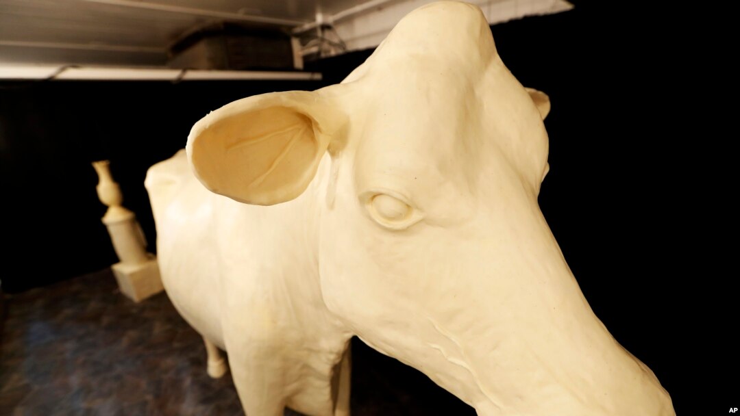 FILE - The Butter Cow is displayed at the 2017 Iowa State Fair in Des Moines, Iowa. 