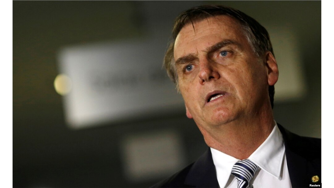FILE - Brazil's President-elect Jair Bolsonaro arrives for a meeting in Brasilia, Brazil, Nov. 20, 2018.