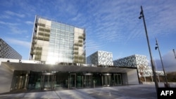 FILE - This file photo taken on Nov. 23, 2015, shows the building of the International Criminal Court in The Hague, The Netherlands. 
