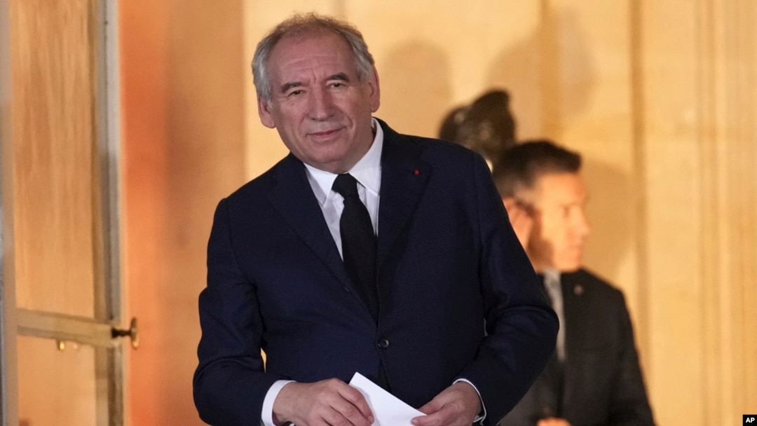 Newly named Prime Minister François Bayrou stands after the handover at the prime minister residence, Dec. 13, 2024 in Paris. 
