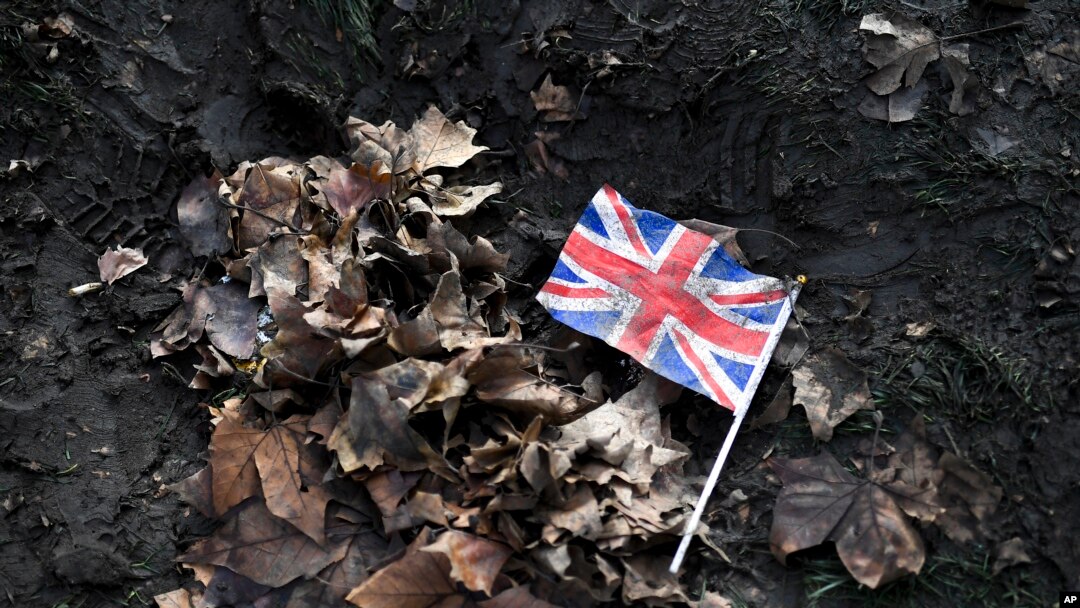FILE - A British Union flag lies on the ground in Parliament Square, London, Feb. 1, 2020. 