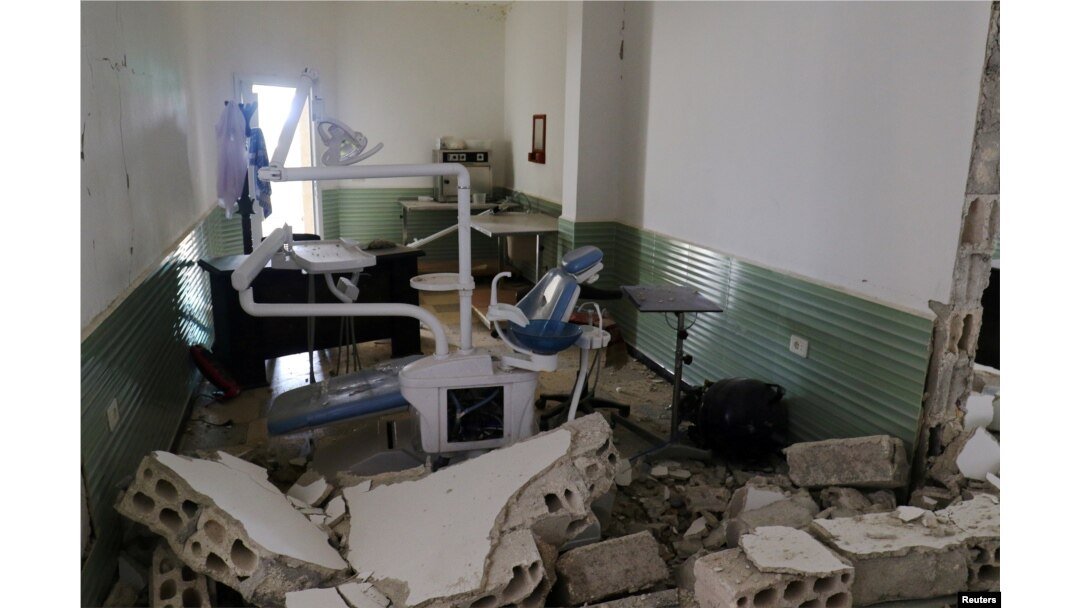 FILE - Damage at a hospital is seen after an airstrike in Deir al-Sharqi village in Idlib province, Syria, April 27, 2017.