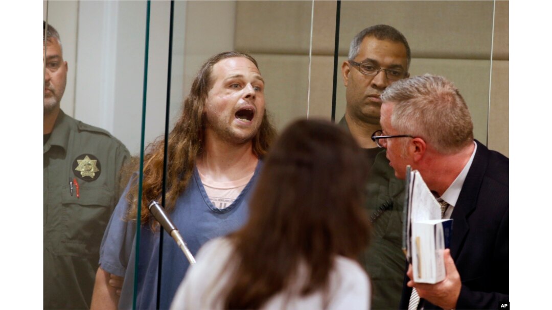 Jeremy Joseph Christian shouts as he is arraigned in Multnomah County Circuit Court in Portland, Ore., May 30, 2017.
