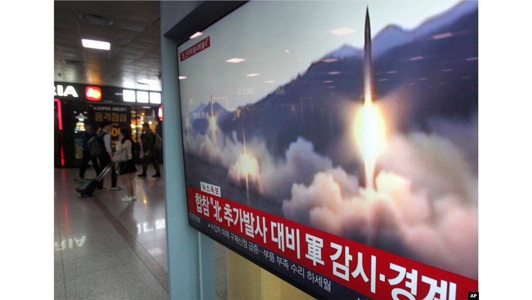 A TV screen shows file footage of North Korea's missile launch during a news program at the Seoul Railway Station in Seoul, South Korea, May 4, 2019.