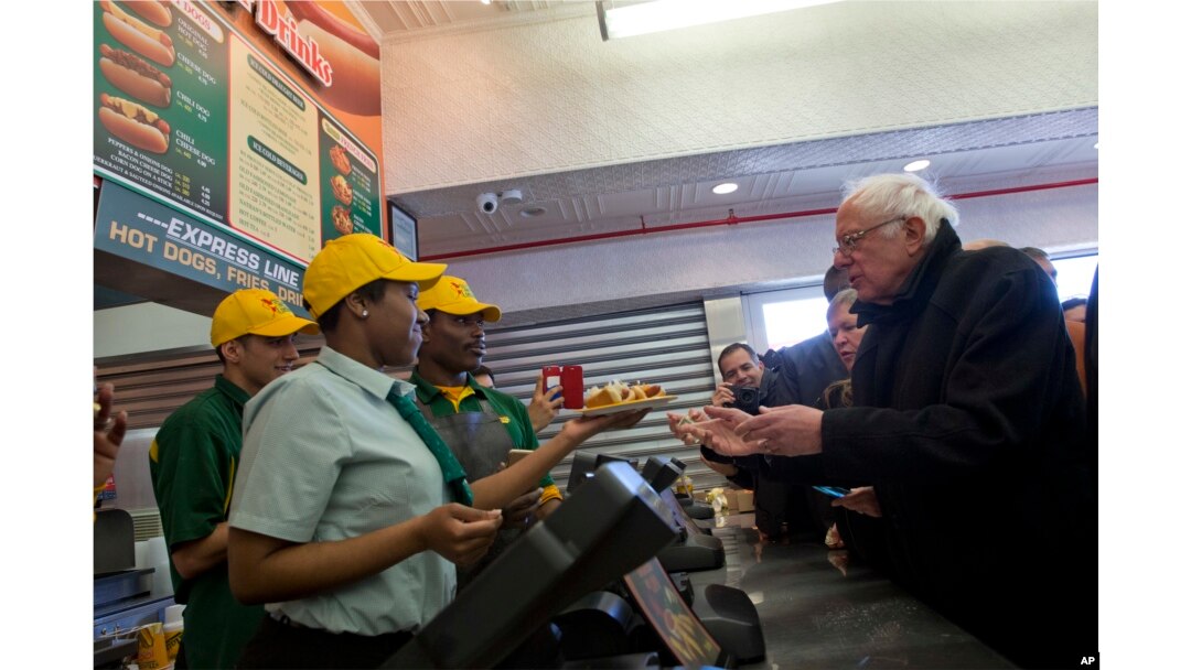 Democratic presidential candidate, Sen. Bernie Sanders, I-Vt., orders hot dogs at Nathans Famous in Coney Island in the Brooklyn borough of New York, Sunday, April 10, 2016.