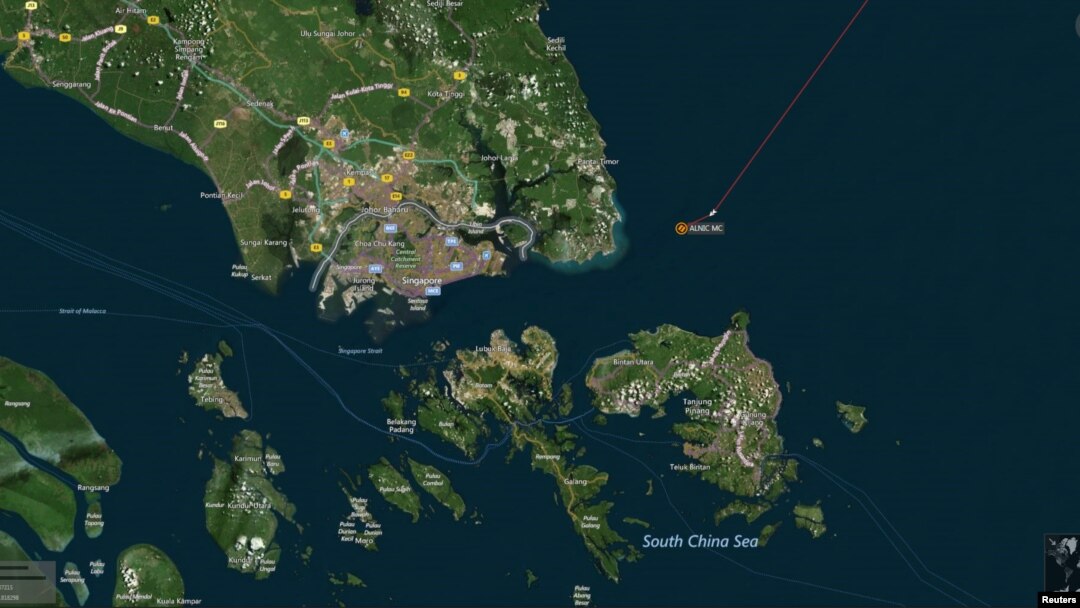 A map shows the location where the Alnic MC merchant vessel came to a halt after a collision with the guided-missile destroyer USS John S. McCain east of Singapore August 21, 2017.
