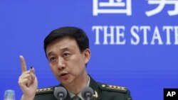 中國國防部發言人吳謙就發表國防白皮書見記者（美聯社2019年7月24日）