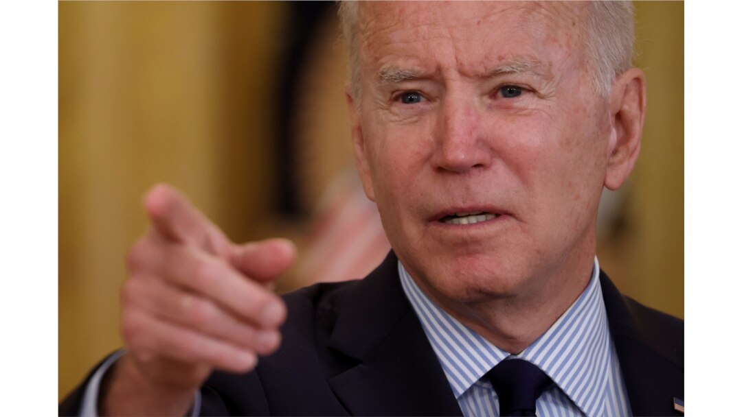 USA, Washington, U.S. President Joe Biden points a finger as he delivers remarks on the April jobs report