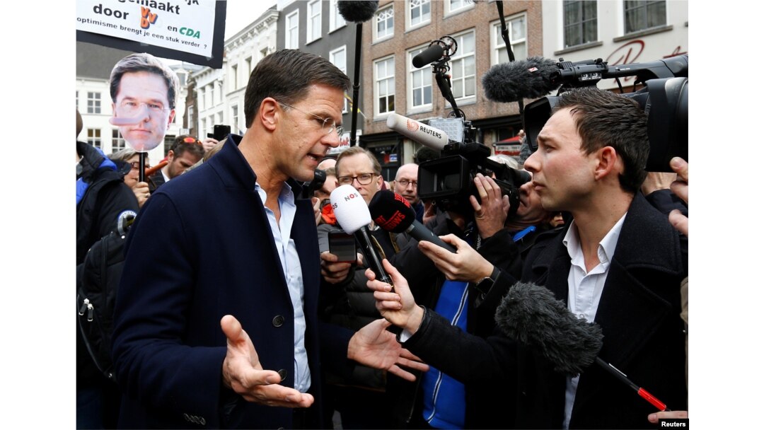 Dutch Prime Minister Mark Rutte of the VVD Liberal party speaks to the media as he campaigns for the 2017 Dutch election in Breda, Netherlands, March 11, 2017.
