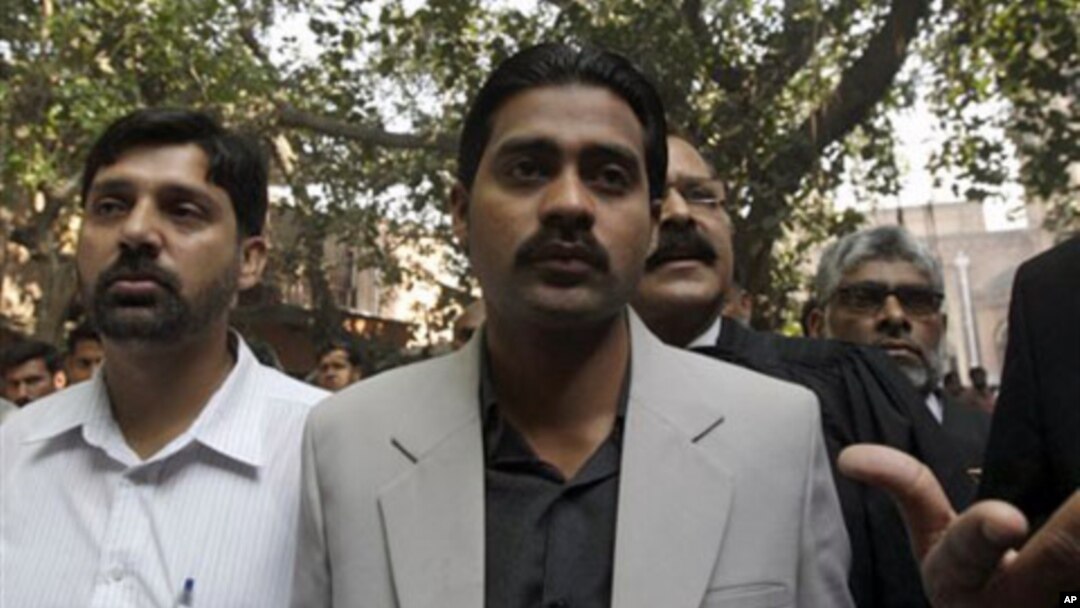 Mohammed Wasim, center, whose brother Mohammed Fahim was shot and killed by Raymond Davis, arrives at a central jail for Davis' hearing in Lahore, Pakistan, March 14, 2011