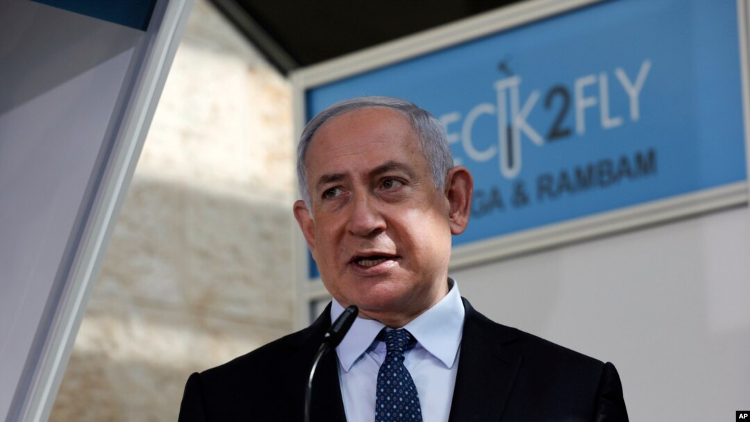 FILE - Israeli Prime Minister Benjamin Netanyahu speaks at Ben-Gurion International Airport, near Tel Aviv, Nov. 9, 2020.