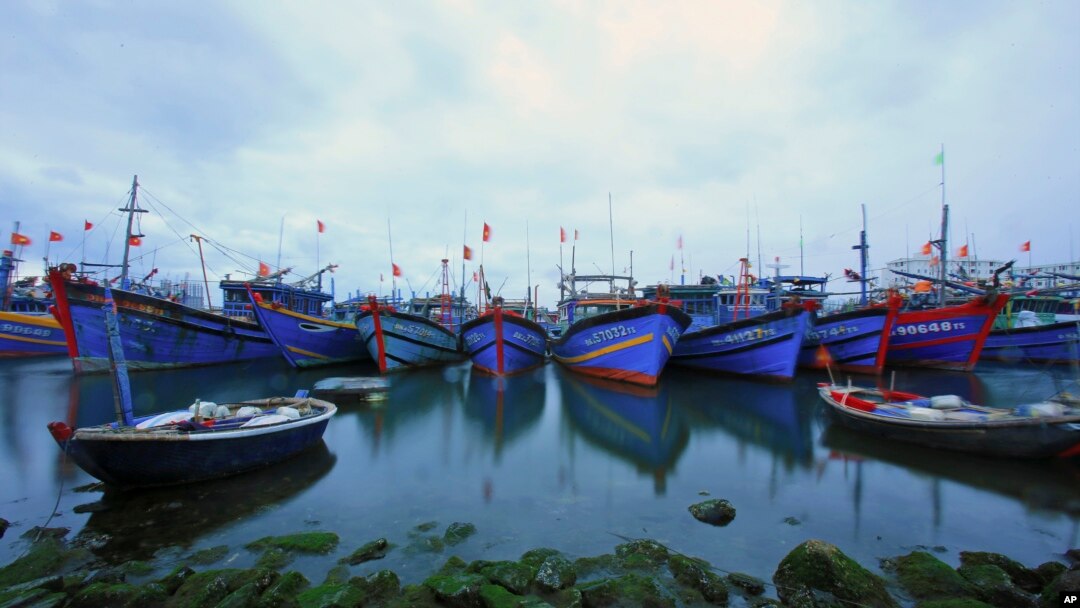 FILE - Fishing boats are docked in Tho Quang port, Danang, Vietnam, March 26, 2016. Fishermen from around the South China Sea tell stories of contending with bandits and coast guards.