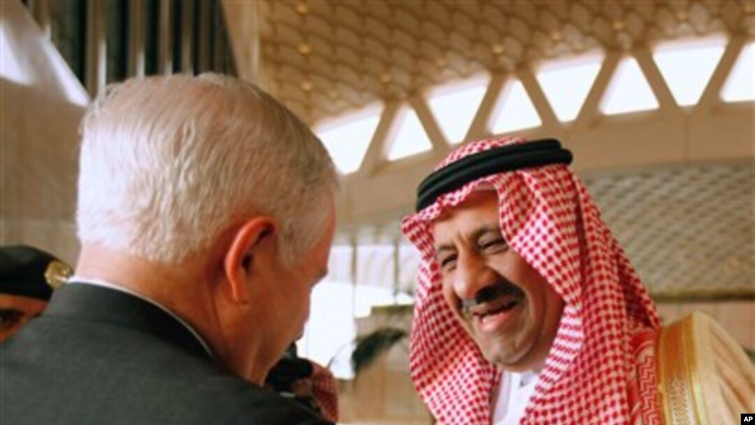U.S. Defense Secretary Robert Gates, left, is greeted by Saudi Assistant Minister of Defense and Aviation Prince Khalid bin Sultan, on Gates' arrival in Riyadh, Saudi Arabia, April 6, 2011