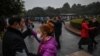 Pride, Caution Evident in Wuhan on Lockdown Anniversary 