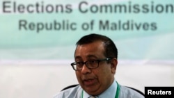 Maldives Election Commissioner Fuwad Thowfeek speaks during a news conference in Male, October 18, 2013. 