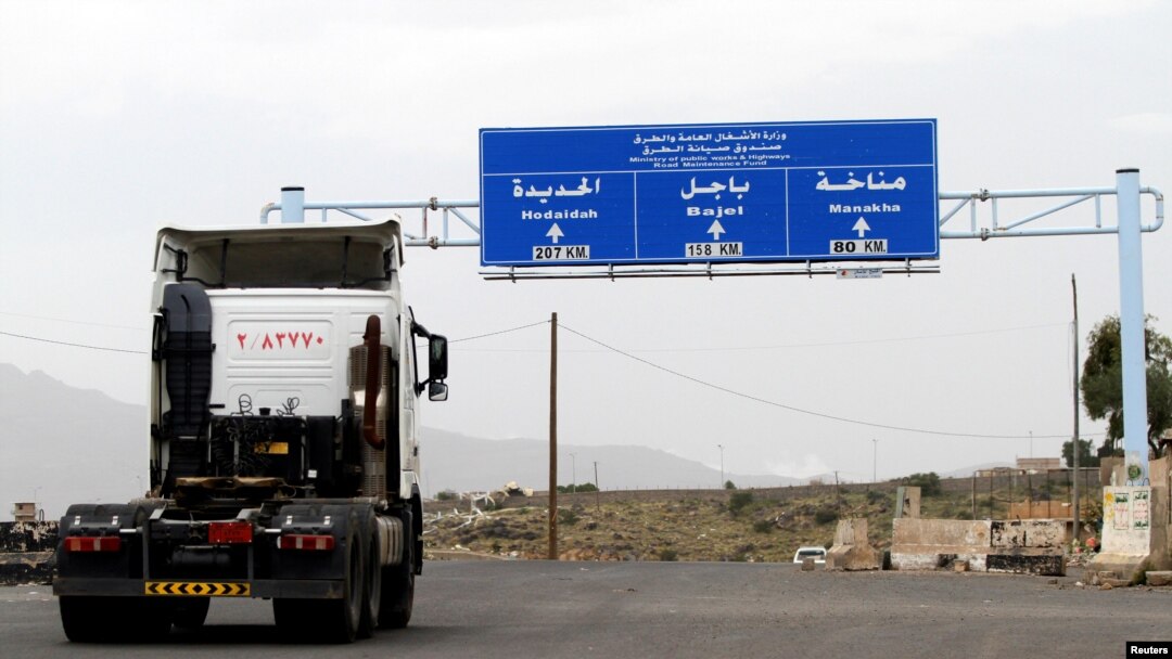 A truck drives on the main road linking Hodeidah with Sanaa, Yemen, Sept.13, 2018. 