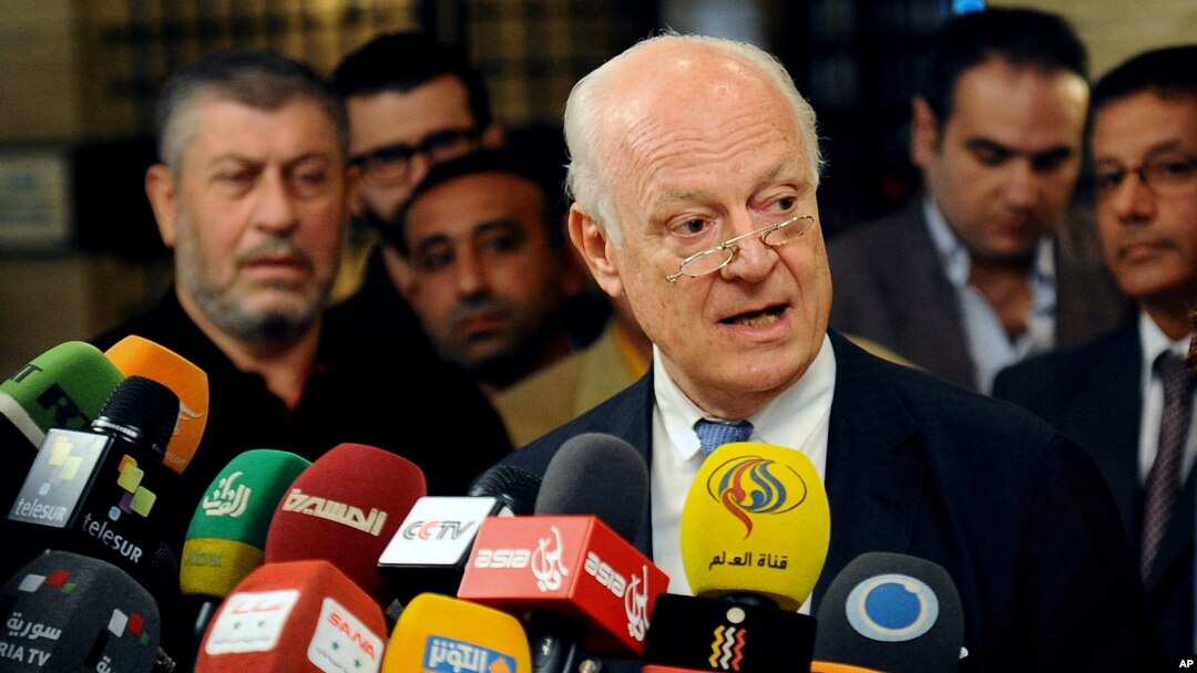 In this photo released by the Syrian official news agency SANA, United Nations special envoy to Syria Staffan de Mistura, speaks during a press conference in Damascus, Syria, Nov. 11, 2014. 