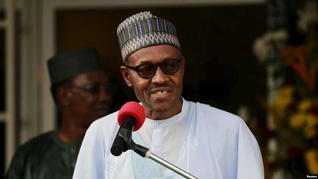 FILE - Nigeria's President Muhammadu Buhari speaks during a news conference after the Summit of Heads of State and Government of The Lake Chad Basin Commission (LCBC) in Abuja, Nigeria, June 11, 2015.