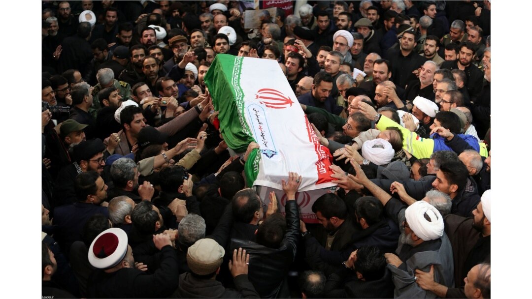 Iranian people carry a coffin of Iranian Major-General Qassem Soleimani, head of the elite Quds Force, who was killed in an airstrike at Baghdad airport, during a funeral procession in Tehran, Iran, Jan. 6, 2020.