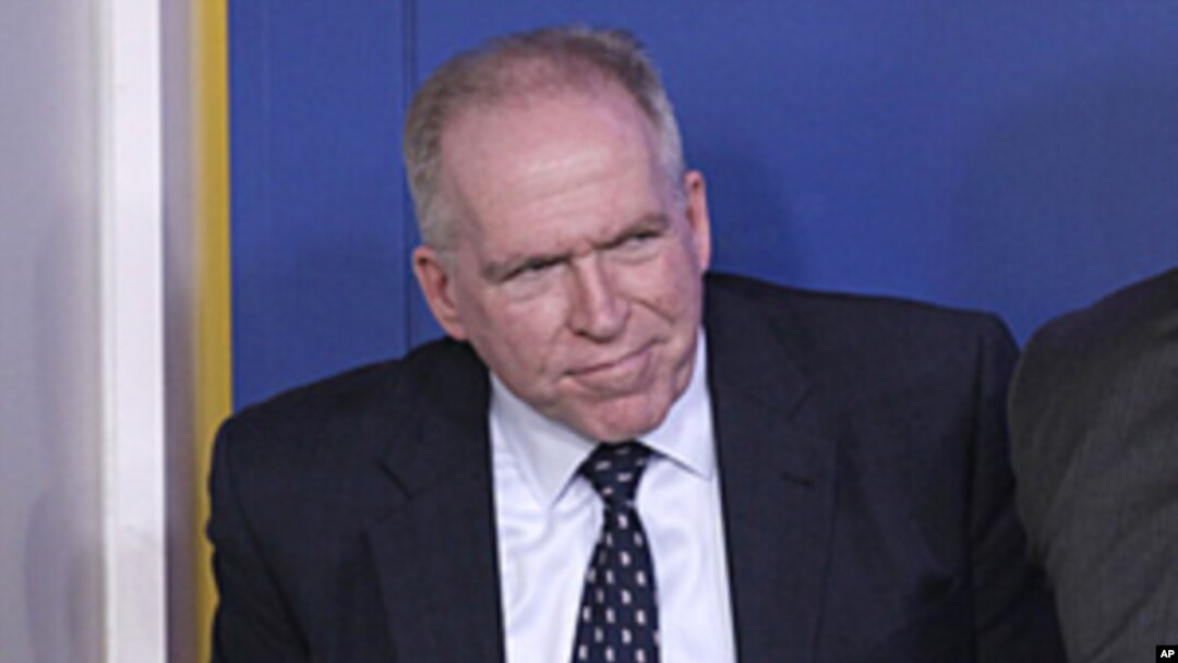 John Brennan exits a daily news briefing at the White House, May 2, 2011