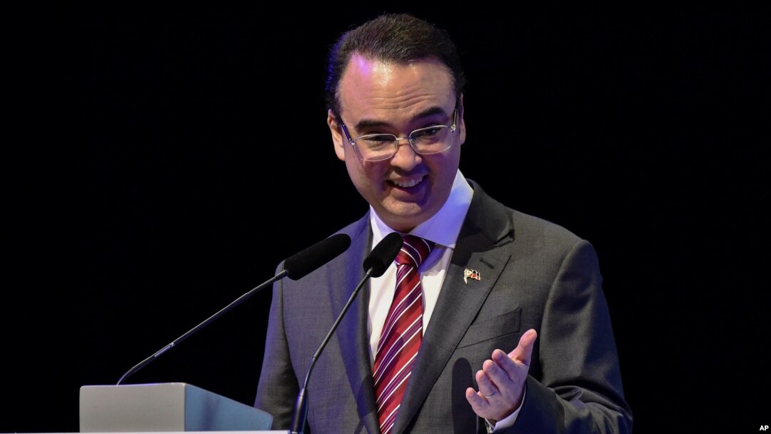 FILE - Philippines Foreign Secretary Alan Peter Cayetano speaks during the opening ceremony of the 50th Association of Southeast Asian Nations (ASEAN) Regional Forum meeting in Pasay city, metro Manila, Philippines, Aug. 5, 2017. 