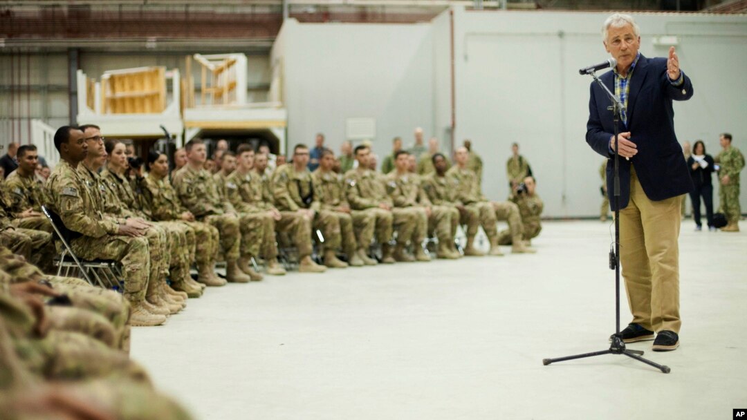 U.S. Defense Secretary Chuck Hagel speaks to members of the military during his visit to Bagram Airfield in Bagram, Afghanistan, June 1, 2014.