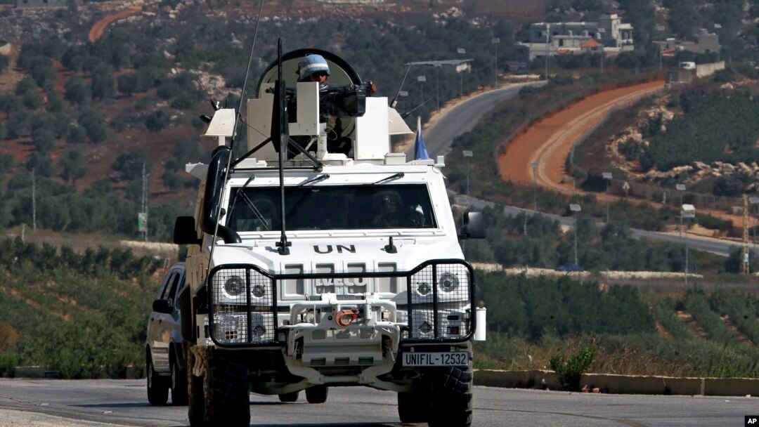 Spanish U.N. peacekeepers patrol the Lebanese Israeli border in the southern village of Odaisa, Lebanon, Aug. 29, 2013. 