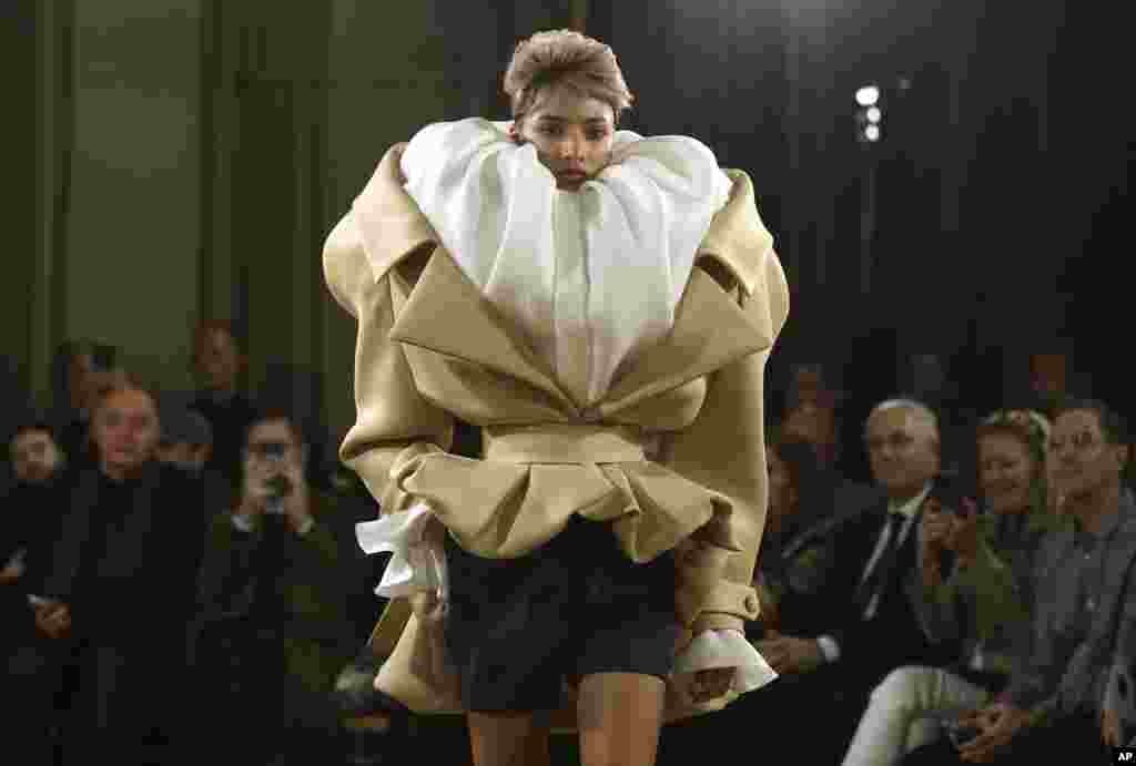 A model wears a creation as part of Viktor & Rolf Haute Couture Spring Summer 2025 collection, presented in Paris.
