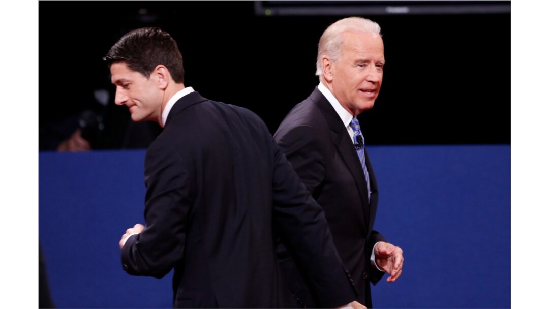FILE - Vice President Joe Biden (R) and Republican vice presidential nominee Paul Ryan depart at the conclusion of the vice presidential debate in Danville, Kentucky, Oct. 11, 2012.