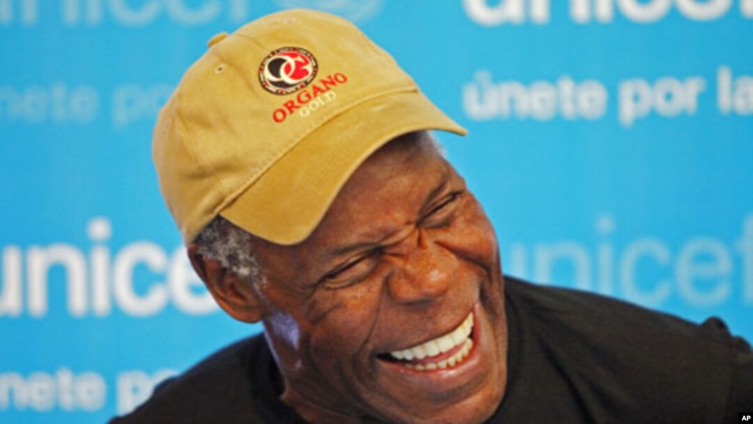 UNICEF Ambassador and actor Danny Glover laughs during an event in Lima October 20, 2010 (file photo)