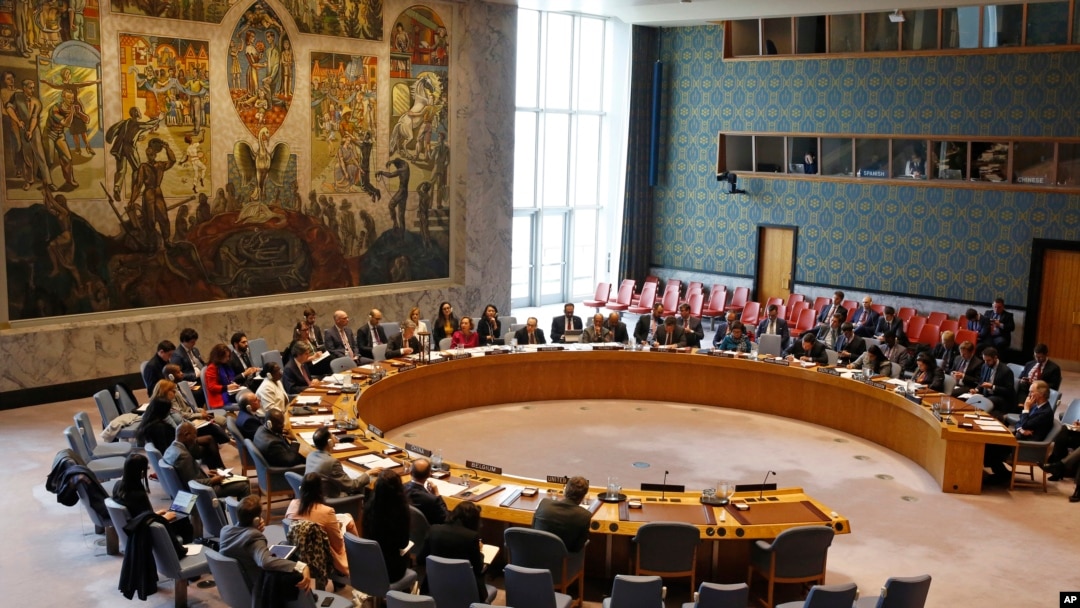 FILE - Members of the U.N. Security Council gather inside the United Nations Security Council chambers in New York, for a meeting on Syria, April 30, 2019.