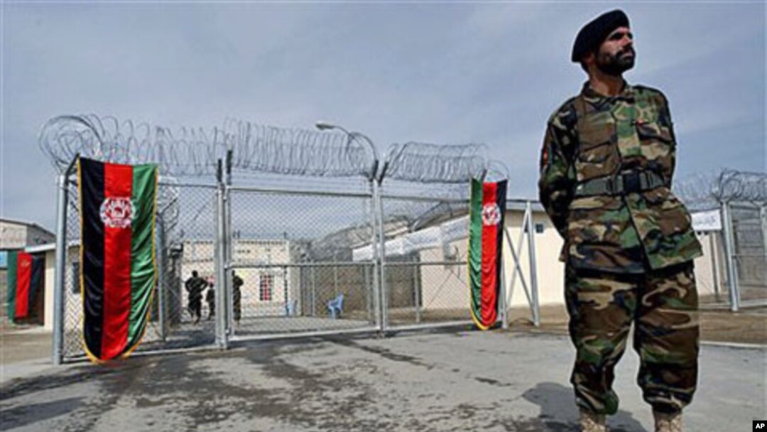 An Afghan National Army soldier stands in front of the gate of the newly refurbished Pul-e-Charkhy prison during an opening ceremony in Kabul, Afghanistan, March 2007 (file photo)