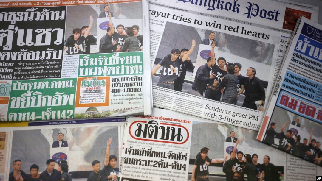 FILE - Front pages of Thai newspapers in Bangkok.