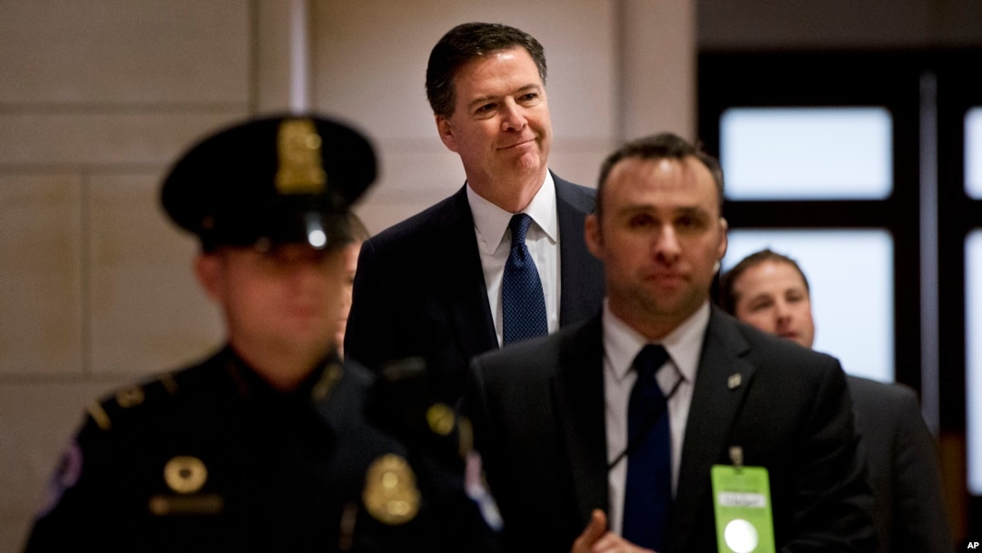 FBI Director James Comey arrives to testify on Capitol Hill in Washington, Dec. 10, 2015. On Thursday, Comey will answer question about why no criminal charges were recommended against Hillary Clinton over her use of a private email server while secretary of state.
