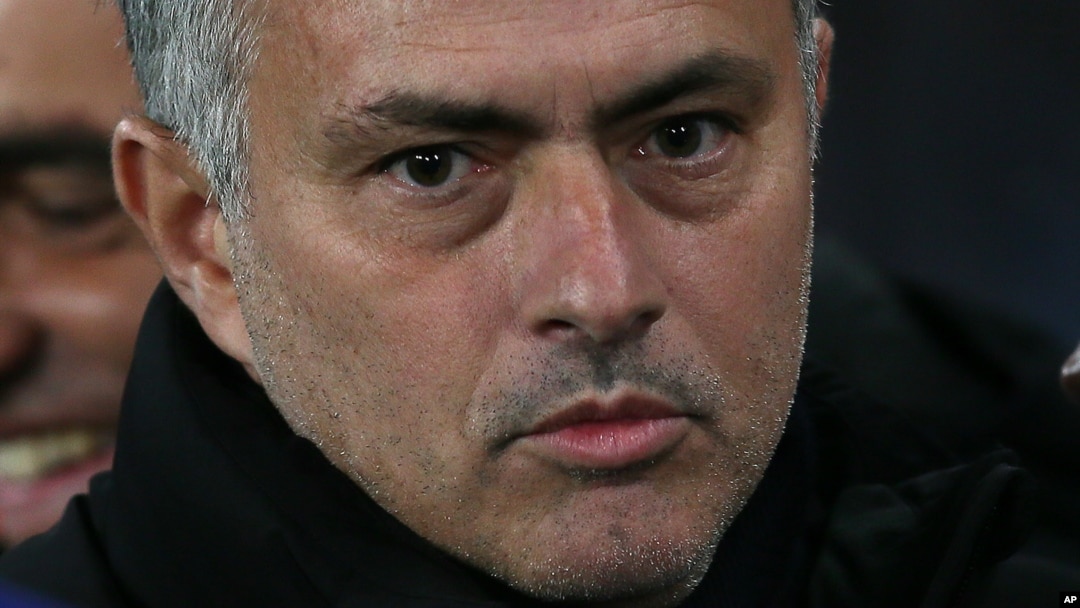 Chelsea Manager José Mourinho looks across the pitch before the Champions League Group G soccer match between Chelsea and Sporting Lisbon at Stamford Bridge in London, Wednesday, Dec. 10, 2014. (AP Photo/Tim Ireland)