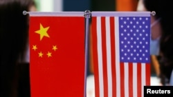 Chinese and U.S. flags displayed at the 2021 China International Fair 