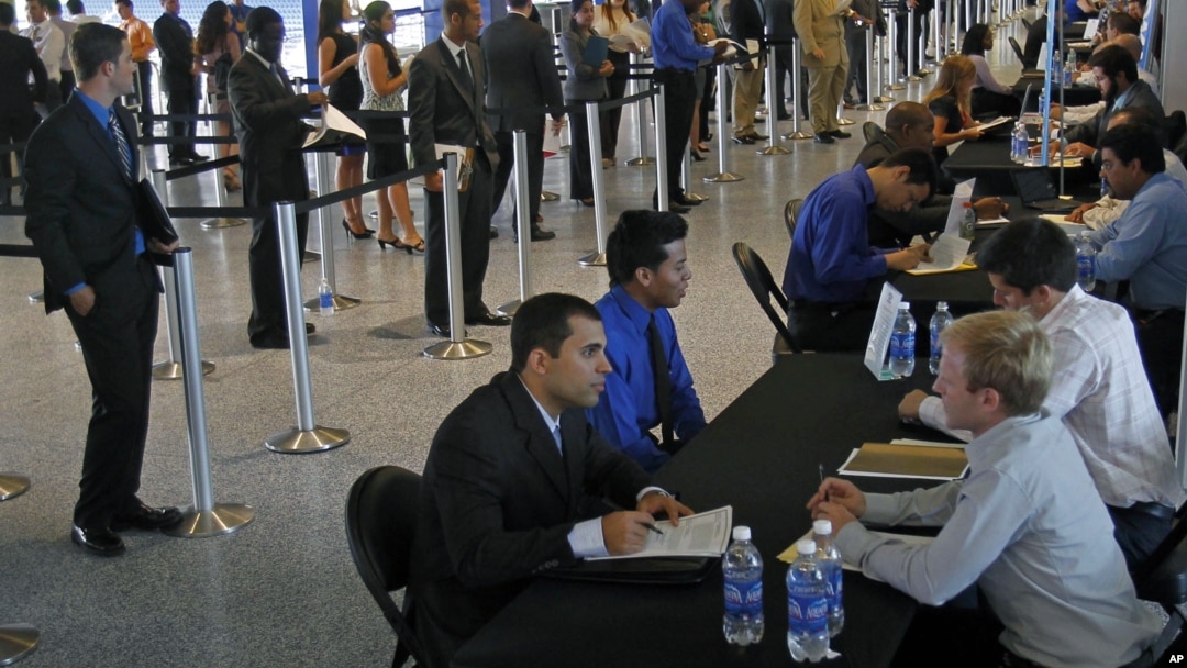 Job applicants receive interviews by Florida Marlins staff at Marlins Park in Miami, Florida, October 24, 2012.