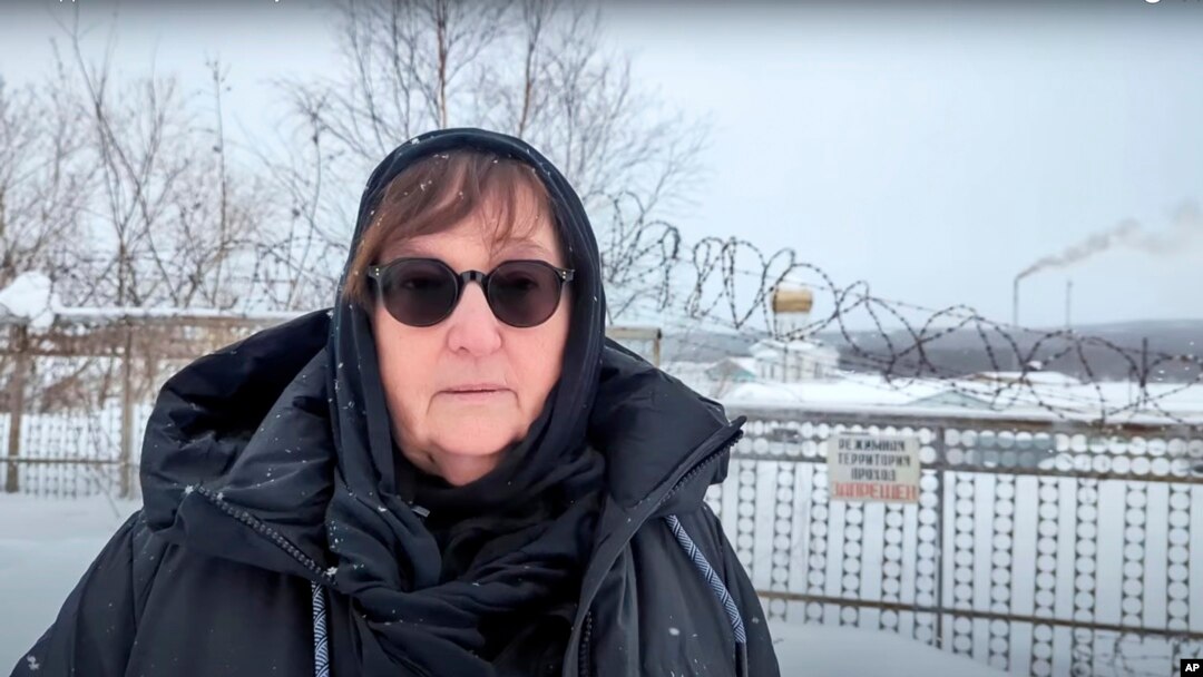 Russian opposition leader Alexey Navalny's mother, Lyudmila Navalnaya, speaks near the prison colony in the town of Kharp, Russia, in this grab taken from video provided by the Navalny Team on Feb. 20, 2024.