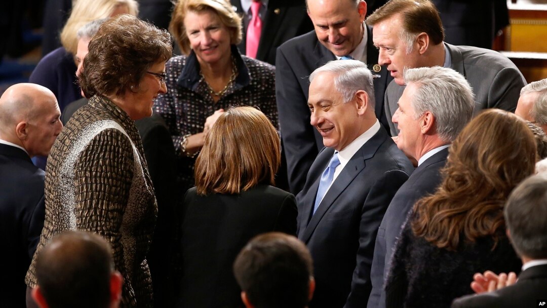 Israeli Prime Minister Benjamin Netanyahu, accompanied by House Majority Leader Kevin McCarthy of Calif., is greeted before addressing a joint meeting of Congress on Capitol Hill in Washington, Tuesday, March 3, 2015. 