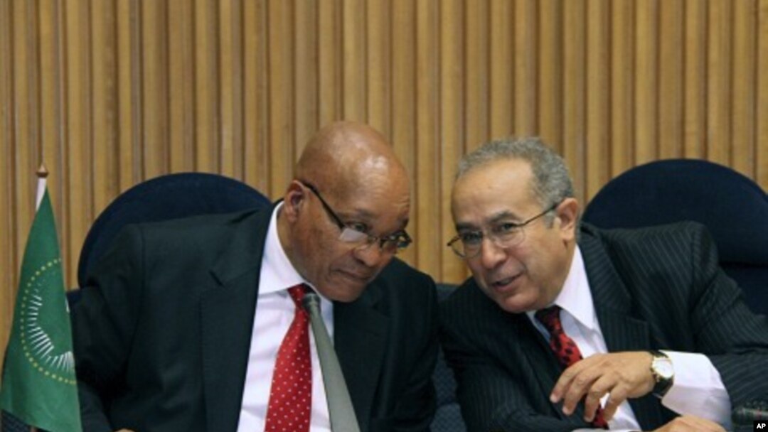 S. African President and Chairperson of the AU Committee on Libya, Jacob Zuma, left, talks with Ramtane Lamamra, African Union Commissioner for Peace and Security in Addis Ababa, Ethiopia, August 26, 2011 during a conference on Libya.
