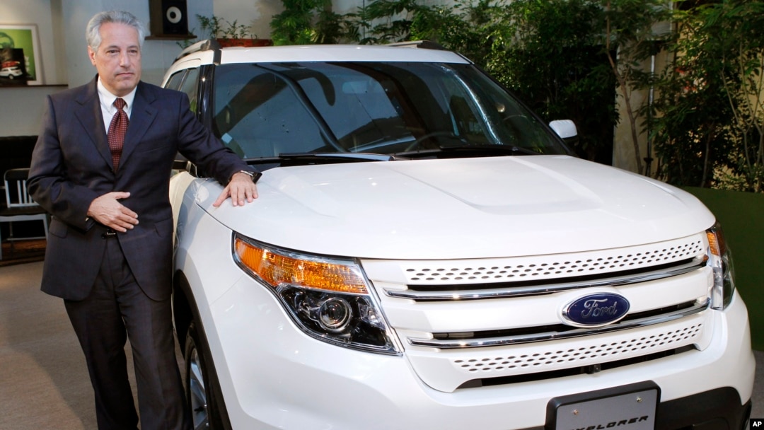 FILE - Ford Japan Chief Executive Timothy Tucker introduces the new Ford Explorer in Tokyo, May 24, 2011. Automaker Ford Motor Co. said Jan. 25, 2016, it will close all operations in Japan and Indonesia this year.