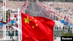 中國在巴布亞新畿內亞舉行一個中國援建項目竣工儀式。（2018年11月16日）