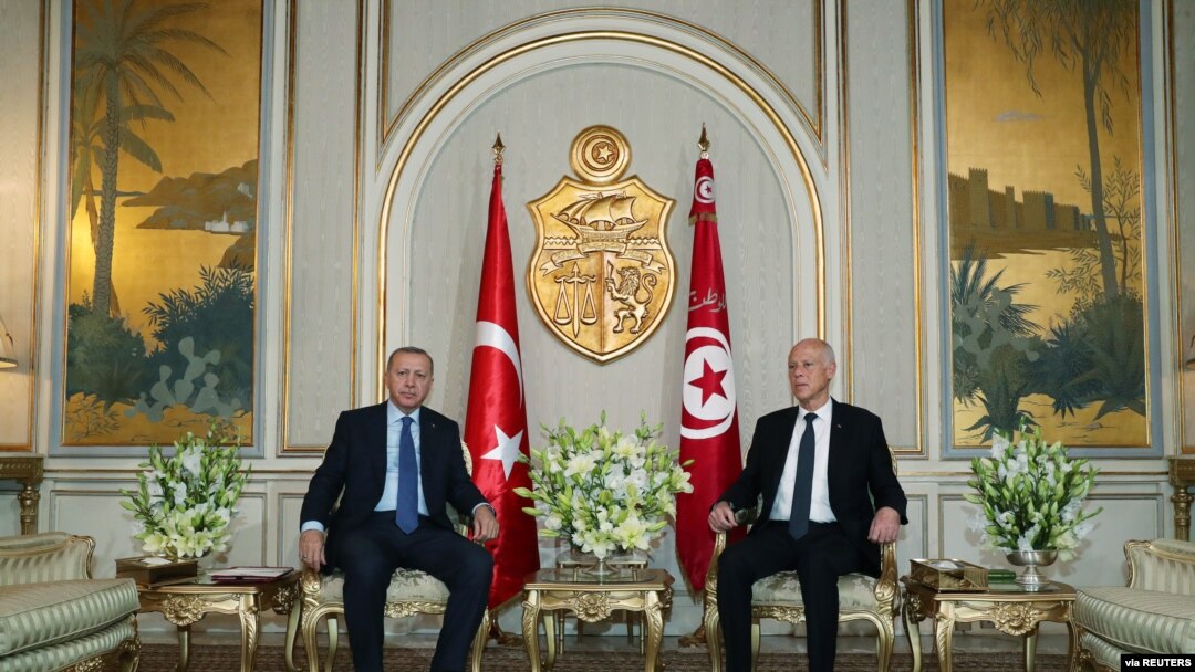 Turkey's President Tayyip Erdogan meets with Tunisia's President Kais Saied in Tunis, Dec. 25, 2019.