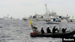 日中兩國船艦因為島嶼爭端而經常出現對峙狀態(資料圖片)