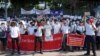 Demonstrators denounce the military coup at a rally in Yangon, Myanmar, Feb. 10, 2021. (VOA Burmese Service)