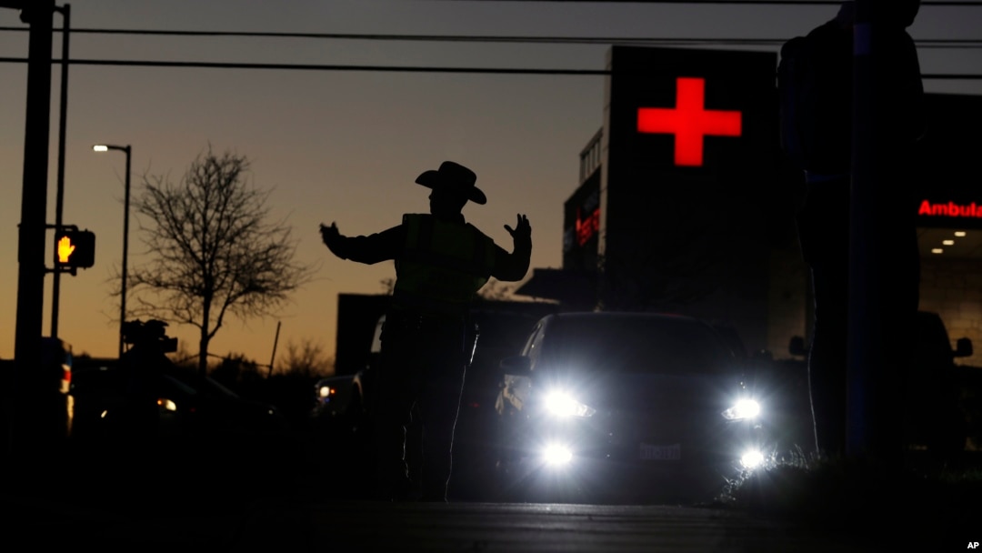Texas troopers help redirect traffic near the site of another explosion, March 20, 2018, in Austin, Texas.